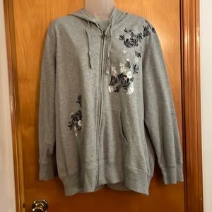 Lightweight gray hoodie with silver and navy front designs